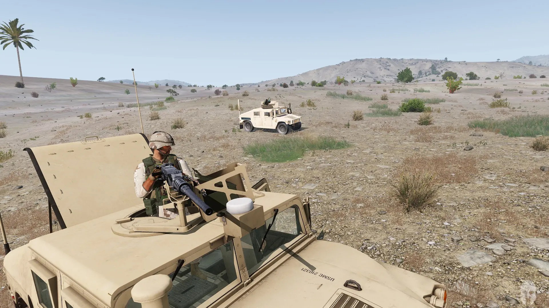 A photo with a M2 and TOW humvee on the desert