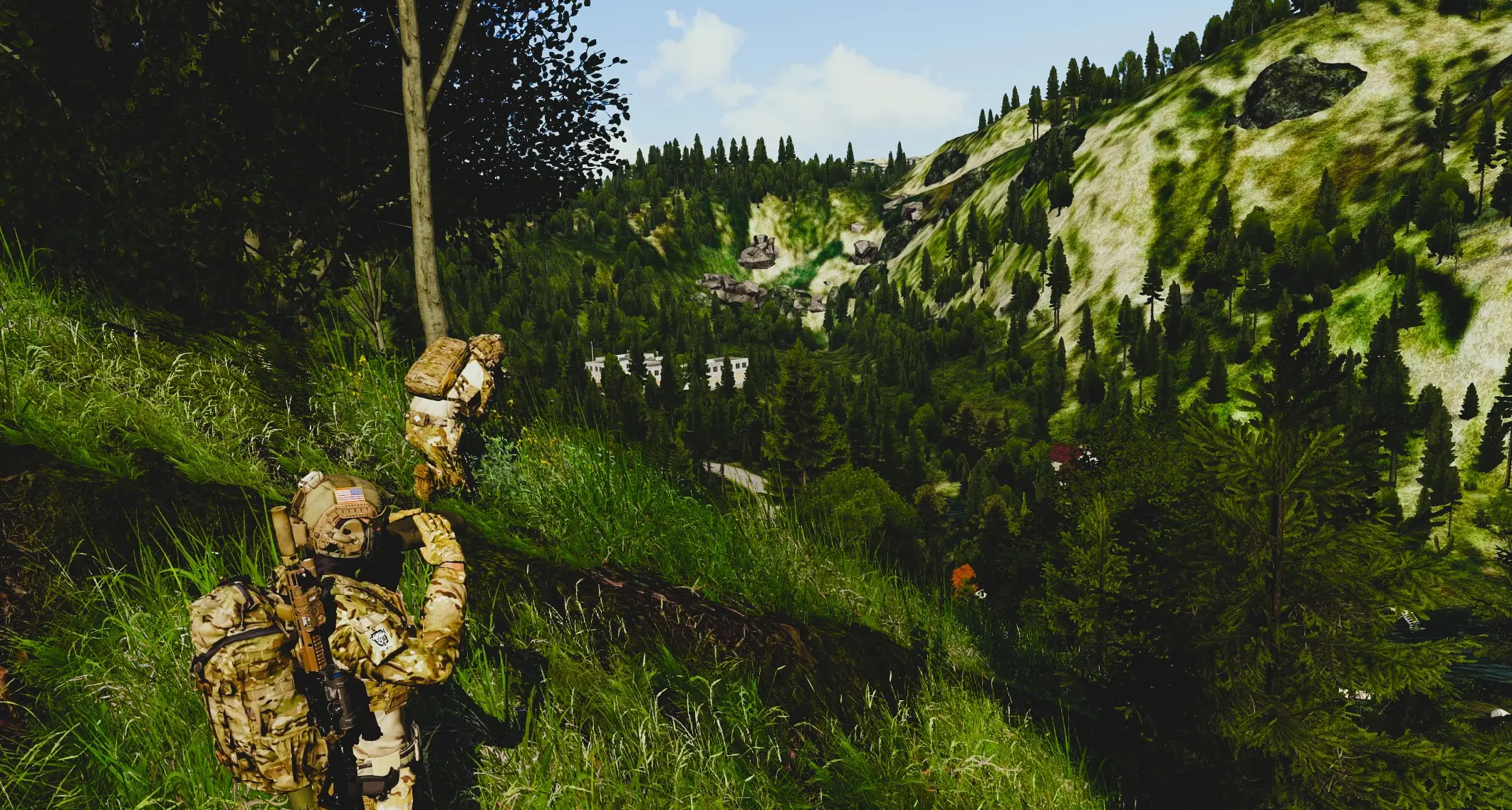 A photo of two solider spoting on a hill